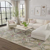 Living room scene with Feizy Beall Ivory/Pink/Green rug, neutral sofa, chair, and light wood accents for a farmhouse vintage feel. Roomscene-Rectangle