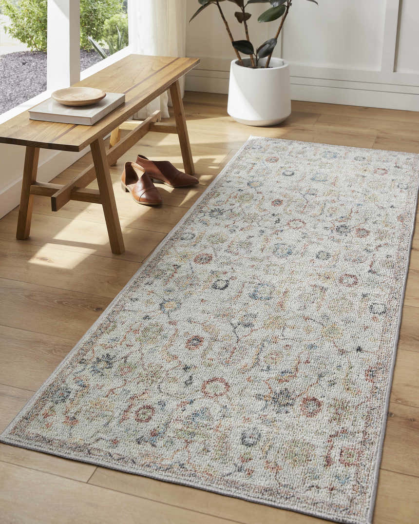 Entryway with Piera Washable Area Rug runner in ash, light gray, and silver. Farmhouse style with wood bench and light wood floors. Roomscene-Runner