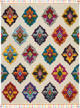 Close-up of Nourison Nomad Ivory Multicolor Floral Area Rug with chestnut accents and colorful tassels.