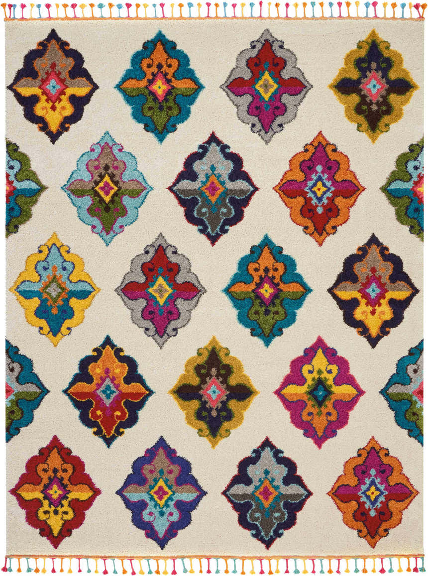 Close-up of Nourison Nomad Ivory Multicolor Floral Area Rug with chestnut accents and colorful tassels.