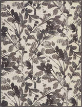 Close-up of the Waverly Vintage Lux Graphite rug, featuring a modern floral pattern in graphite on a light neutral background.