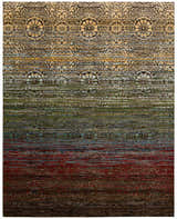 Close-up of the Nourison Rhapsody Multicolor rug. Floral pattern in beige, gold, green, blue, and red hues. Machine made.