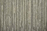 Close-up of the Feizy Braeside Transitional Abstract rug. Taupe and gray wool and viscose with a textured, vertical stripe design. Texture
