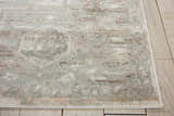 Close-up of the Nourison Euphoria Ivory Persian rug, showing chestnut accents and a soft, textured pile.