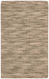 Close-up of the Waverly Grand Suite Stone Indoor Area Rug. Handmade wool rug in a sandstone color with a subtle horizontal texture.