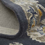Close-up of the Feizy Prescott rug in blue, silver, and gray, showing the floral pattern and hand-tufted texture. Fold