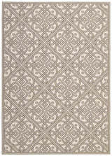 Close-up of the Waverly Sun N' Shade Stone Modern Area Rug featuring a geometric sandstone pattern and mid-century modern design.