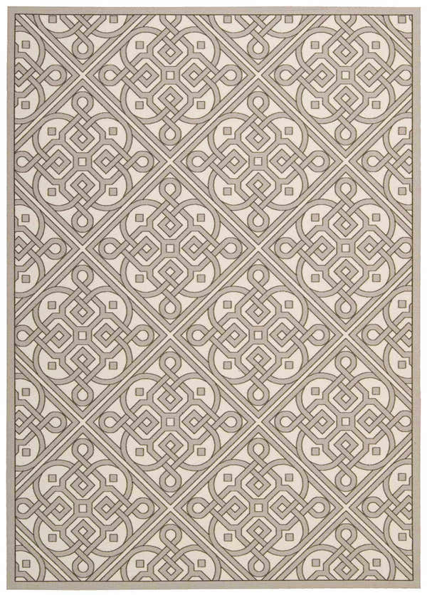 Close-up of the Waverly Sun N' Shade Stone Modern Area Rug featuring a geometric sandstone pattern and mid-century modern design.
