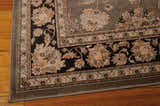 Close up of the Nourison Ararat Grey Persian rug showing floral pattern and border detail.