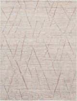Close-up of the Nourison OCEAN Stone Modern Indoor Area Rug. Sandstone color with a geometric pattern.