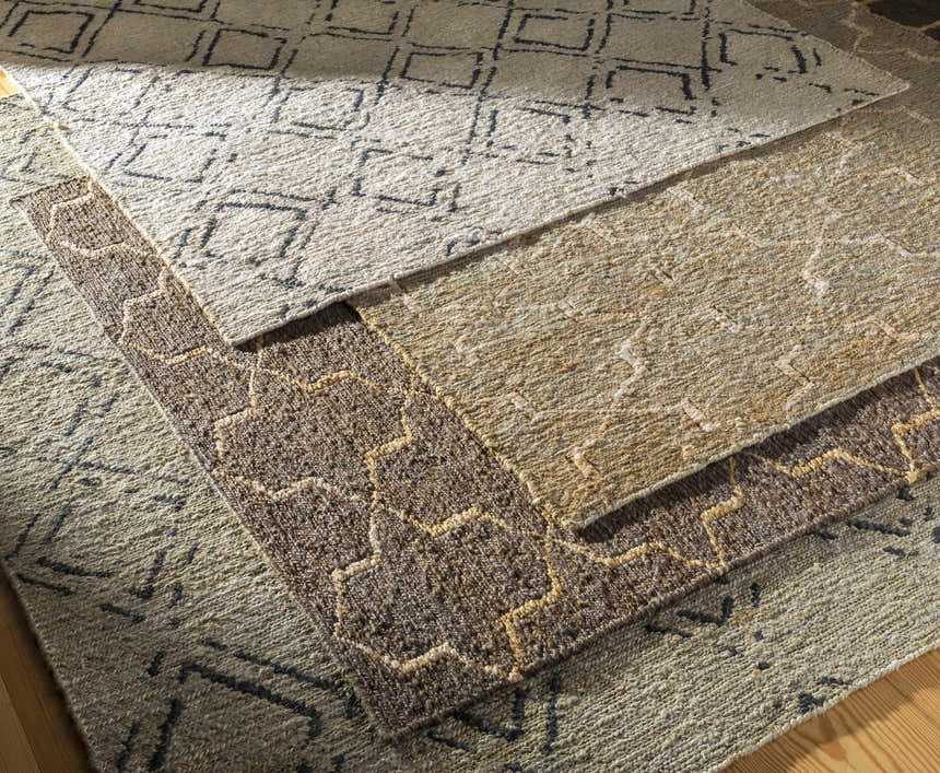 Close-up of Barlig Beige Trellis Jute Carpet showing hand-woven texture and geometric trellis pattern in beige and black. Styleshot