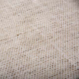 Close-up of the hand-loomed Rizzy RMI677 area rug, beige and light brown tone on tone wool texture. Texture