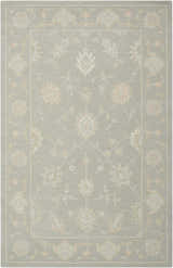 Close-up of Nourison Zephyr Light Taupe rug. Features a floral pattern, ivory and light peach accents, and a soft wool texture.