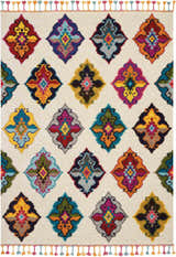 Close-up of Nourison Nomad Ivory Multicolor Floral Area Rug with colorful diamond-shaped medallions and tassels.