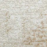 Close-up of the high pile Nourison Dekor Ivory Beige rug, showing chestnut color variations and soft texture.