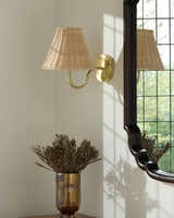Orange Traditional Wall Sconce with rattan details for hallway or bedroom lighting