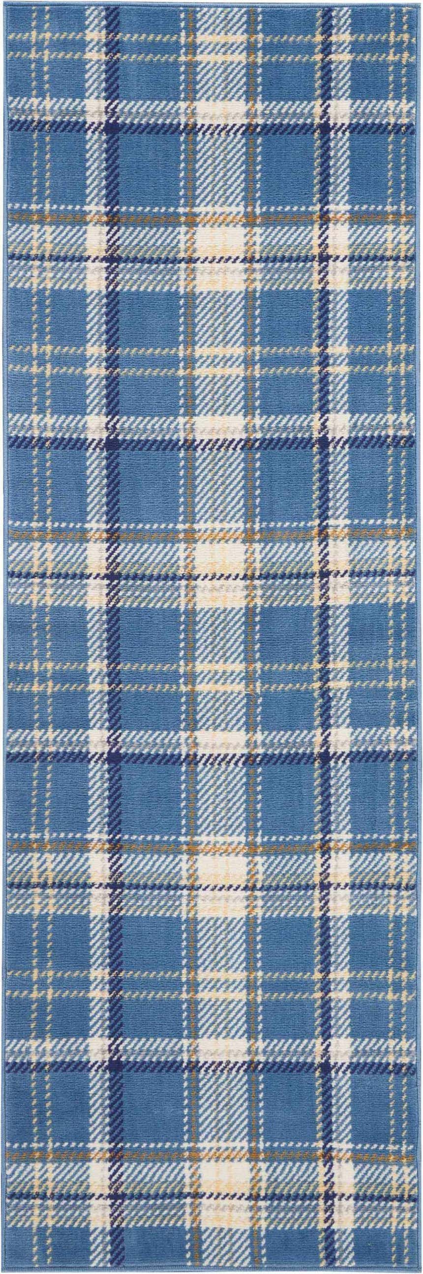 Close-up of the Nourison Grafix Blue Rustic Indoor Area Rug, featuring a classic plaid pattern in blue, cream, and gold.