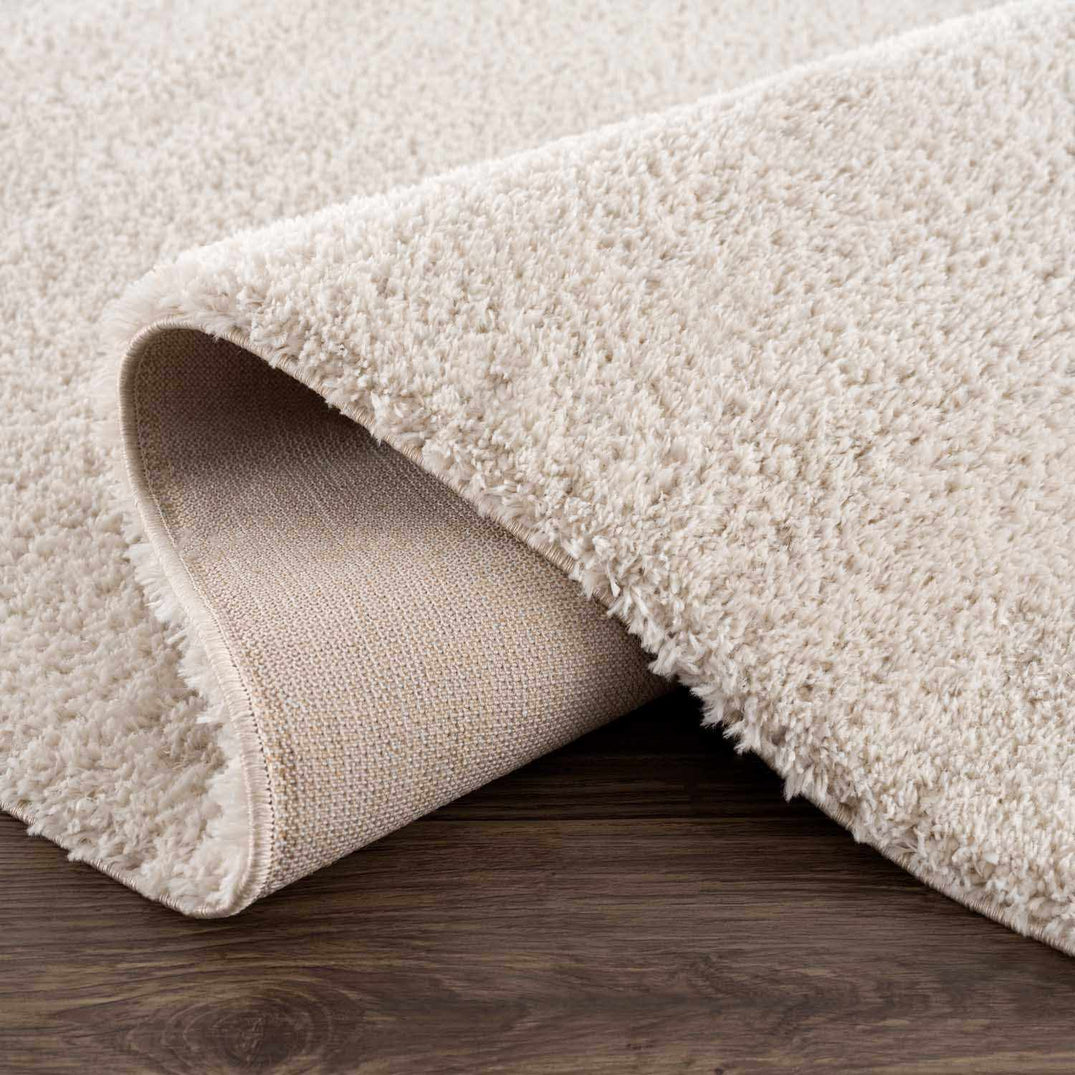 Solid Plush Rug Heavenly Solid Beige Plush Rug – Boutique Rugs