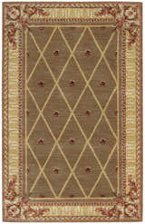 Close-up of Nourison Ashton House Cocoa rug. Vintage style with camel diamonds, floral accents, and ornate border.