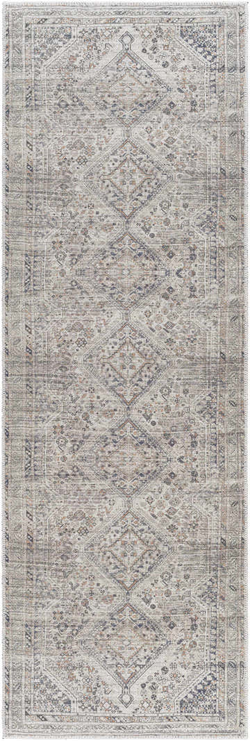 Close-up of the Barny Beige Flat Pile Washable Rug, showcasing its traditional farmhouse pattern in ivory, gray, and slate blue. Design-Runner-27710