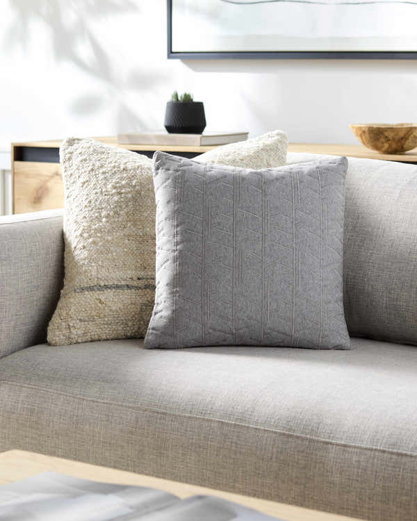 Manus Off White Throw Pillow