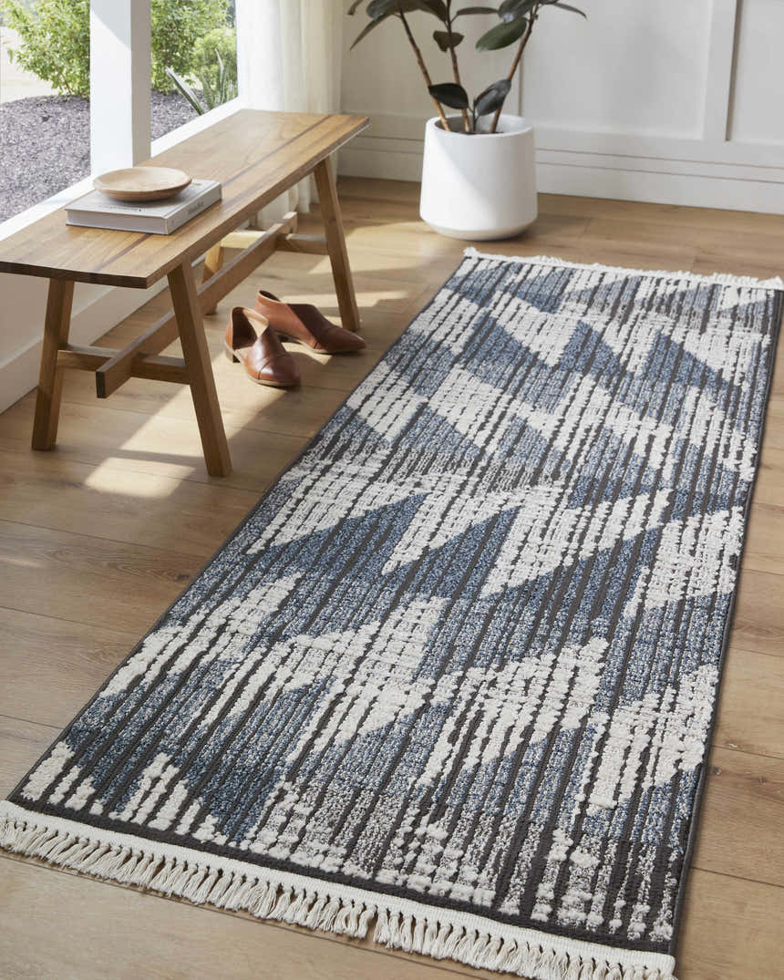 Entryway with Zaim Area Rug runner. Geometric blue and white design, wood bench, and modern decor. Roomscene-Runner