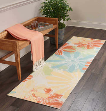 Entryway with Nourison Home & Garden Ivory Contemporary Area Rug runner, wood bench, orange throw, and potted plant.