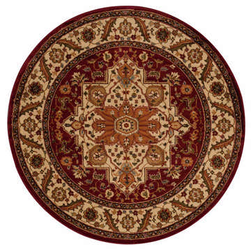 Close-up of round Nourison Paramount Gold Persian rug. Features a red, gold, and cream floral pattern.