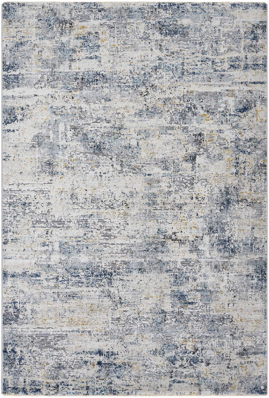 Close-up of the Hyman Area Rug: a contemporary rug in camel, denim, and gray with a distressed, abstract pattern. Design-Rectangle-575