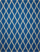 Close-up of Nourison Portico Navy Colorful Area Rug with a cream trellis pattern on a blue background.