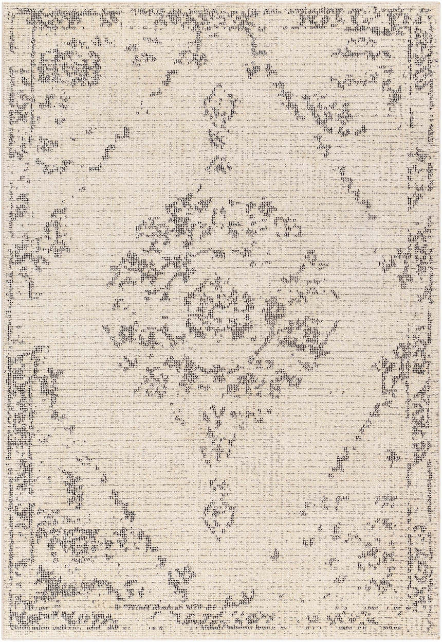 Close-up of the Tait Area Rug. Bone rug with a traditional dark gray pattern. Machine woven polyester rug. Design-Rectangle-537