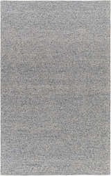 Close-up of Alyra Light Blue Solid Area Rug. Hand-woven wool rug with a subtle textured pattern. Design-Rectangle-576