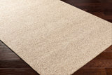 Alyra Tan Solid Area Rug - Clearance