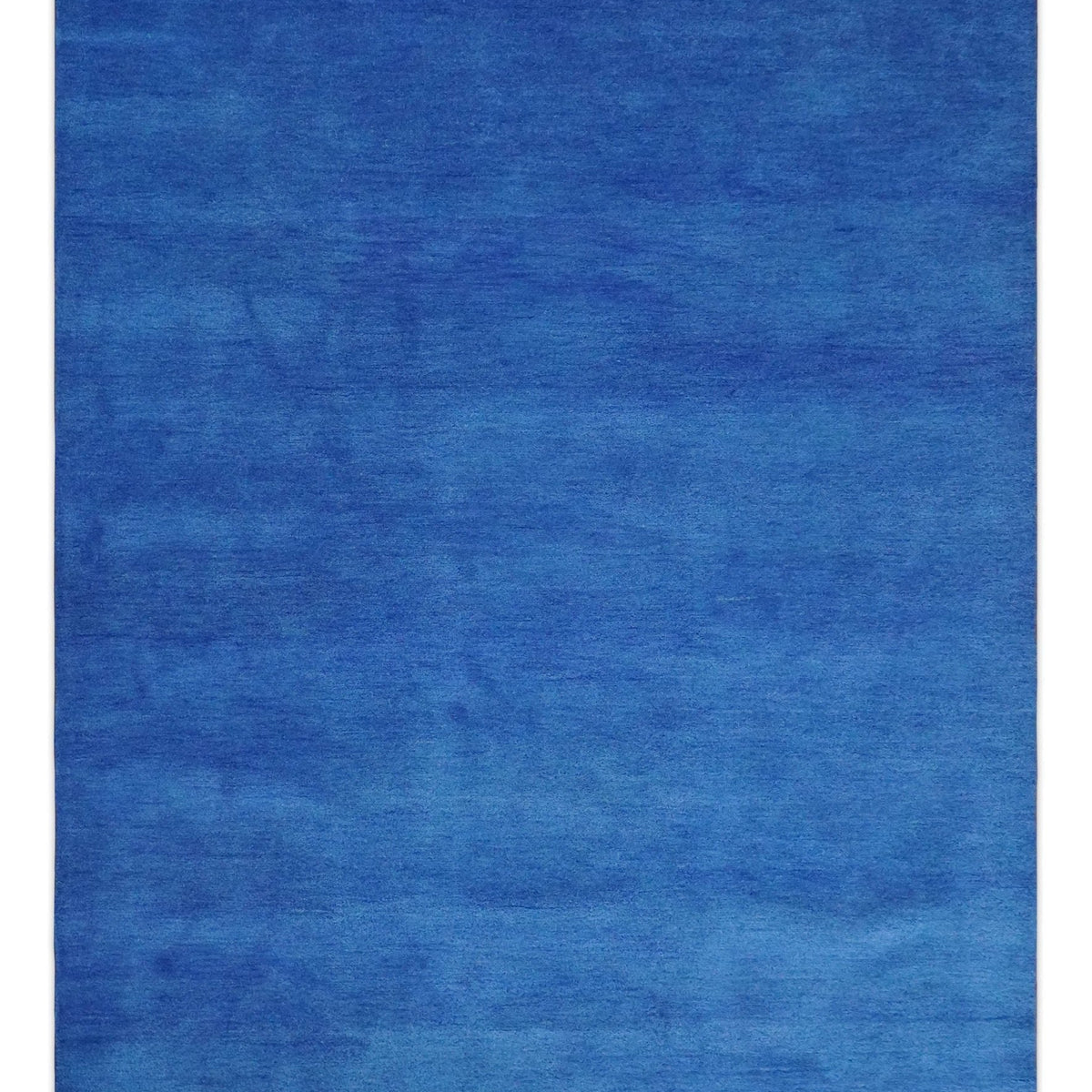 Custom made solid Blue Woolen Hand Tufted contemporary area Rug ...