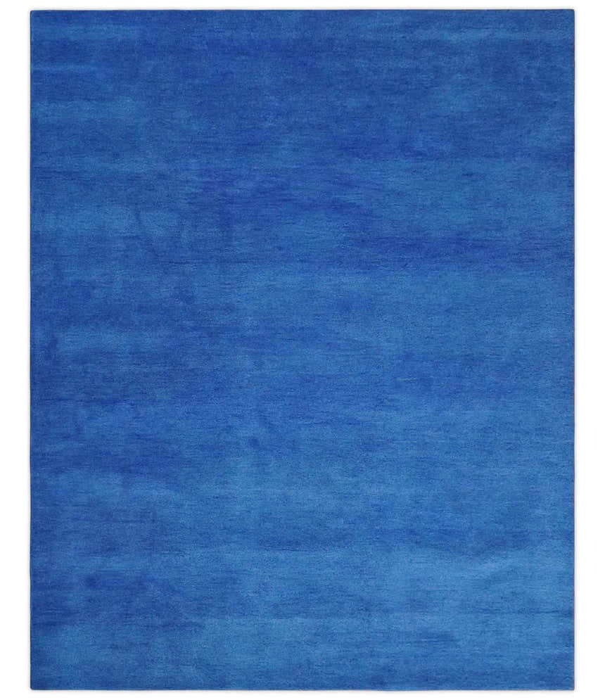 Custom made solid Blue Woolen Hand Tufted contemporary area Rug