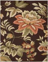Close-up of Nourison Fantasy Chocolate rug. Brown rug with large floral pattern in shades of peach, cream, and green.