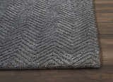 Close up of the Nourison Deco Mod Grey rug showing the chevron pattern and textured pile.