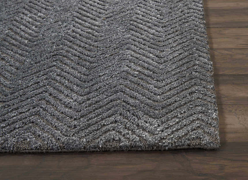 Close up of the Nourison Deco Mod Grey rug showing the chevron pattern and textured pile.