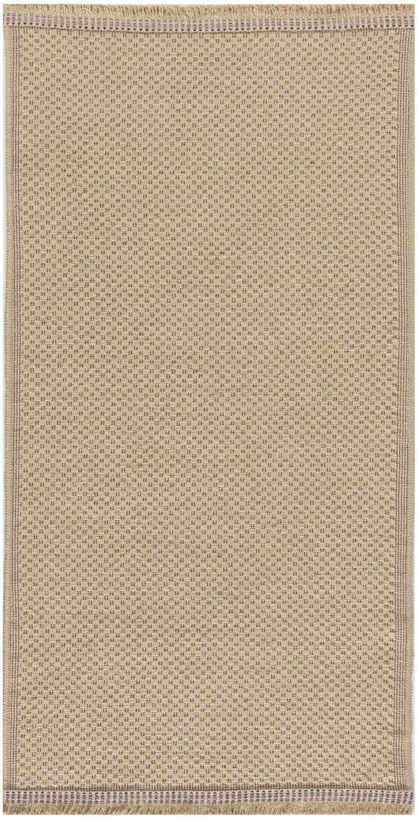 Close-up of the Nourison Jute Natural rug. Neutral jute with a subtle woven dot pattern and fringed edge.