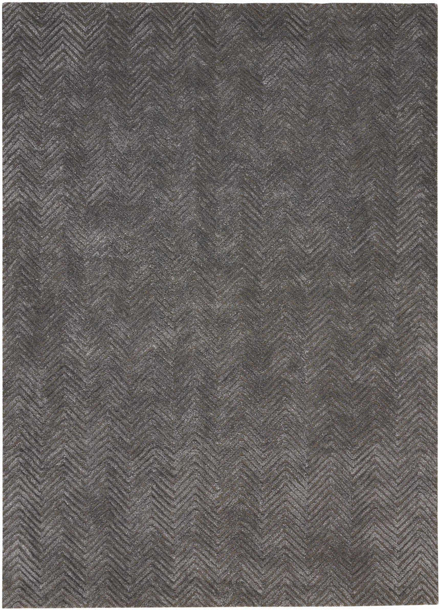 Close-up of the Nourison Deco Mod Grey rug featuring a subtle, textured chevron pattern.