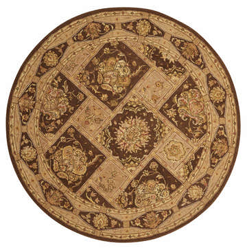 Close-up of the round Nourison 3000 Brown rug. Features a floral, geometric pattern in dark brown, beige, and cream tones.