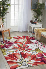 Bright living room with Nourison Fantasy Ivory rug featuring large chestnut floral pattern.