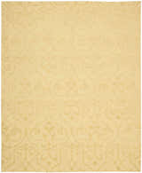 Close-up of the tan Nourison Ambrose Straw area rug featuring a subtle, handmade geometric and floral pattern.