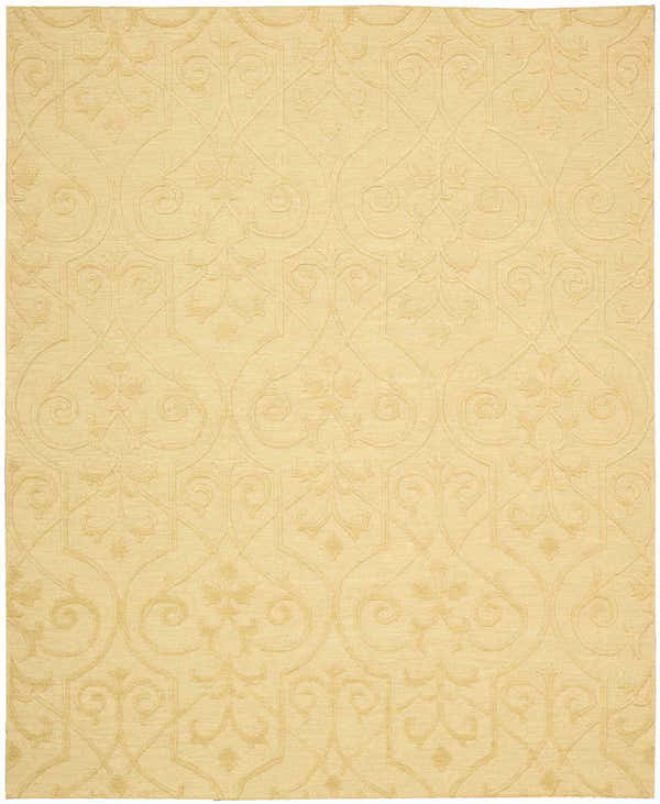 Close-up of the tan Nourison Ambrose Straw area rug featuring a subtle, handmade geometric and floral pattern.