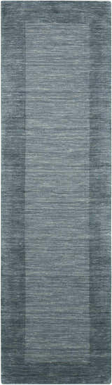 Close-up of Barclay Butera Ripple Spa runner rug. Handmade wool rug in spa blue, with subtle border detail.