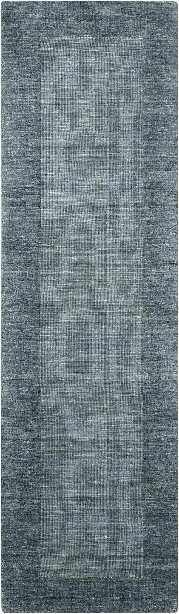 Close-up of Barclay Butera Ripple Spa runner rug. Handmade wool rug in spa blue, with subtle border detail.