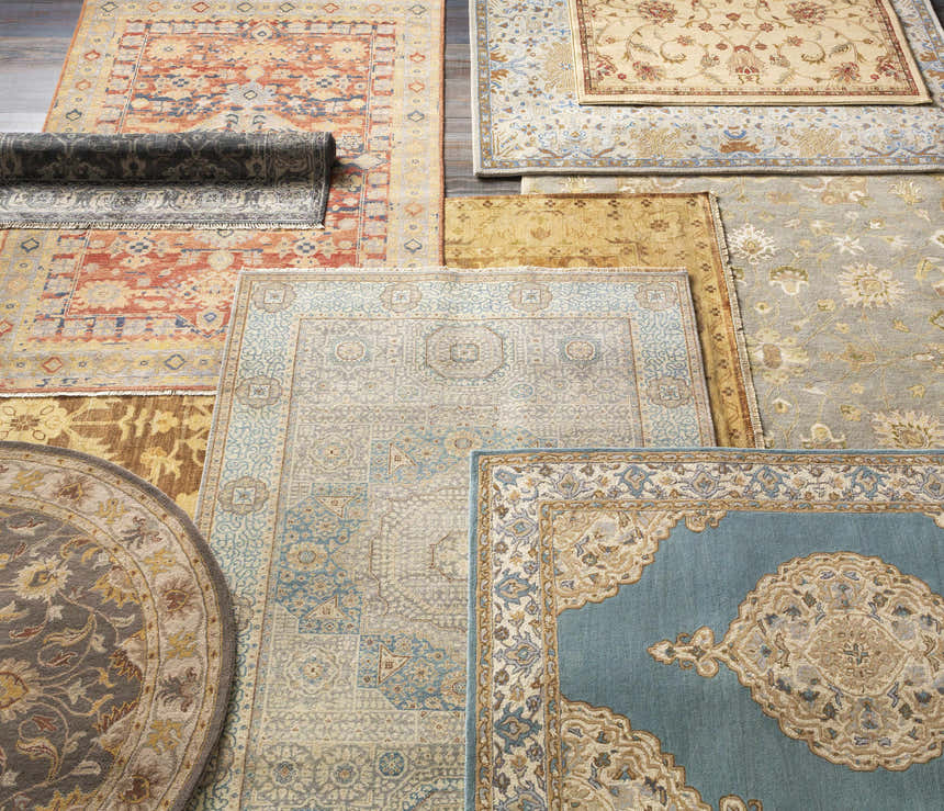 Overhead shot of multiple Lochmaben Premium Wool Rugs in various colors, patterns, and shapes. Hand-knotted wool rug textures. Styleshot