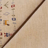 Tribal Border Ivory Design Hand Loomed Wool Area Rug