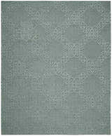 Close-up of the taupe Nourison Ambrose Slate rug featuring a geometric pattern and handmade wool texture.