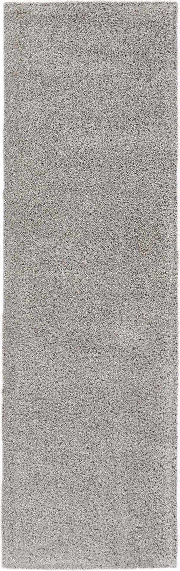 Close-up of the plush texture of the Nourison Malibu Shag Silver Grey area rug.